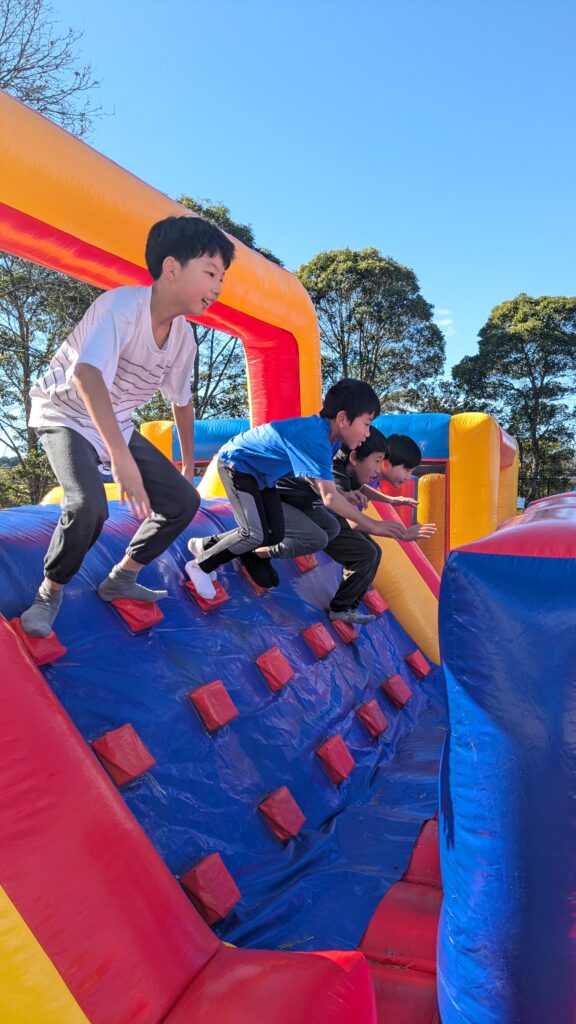 SISA school holiday programs, sports, fun, inflatable world, inflatable fun, bouncing castle school holidays fun,